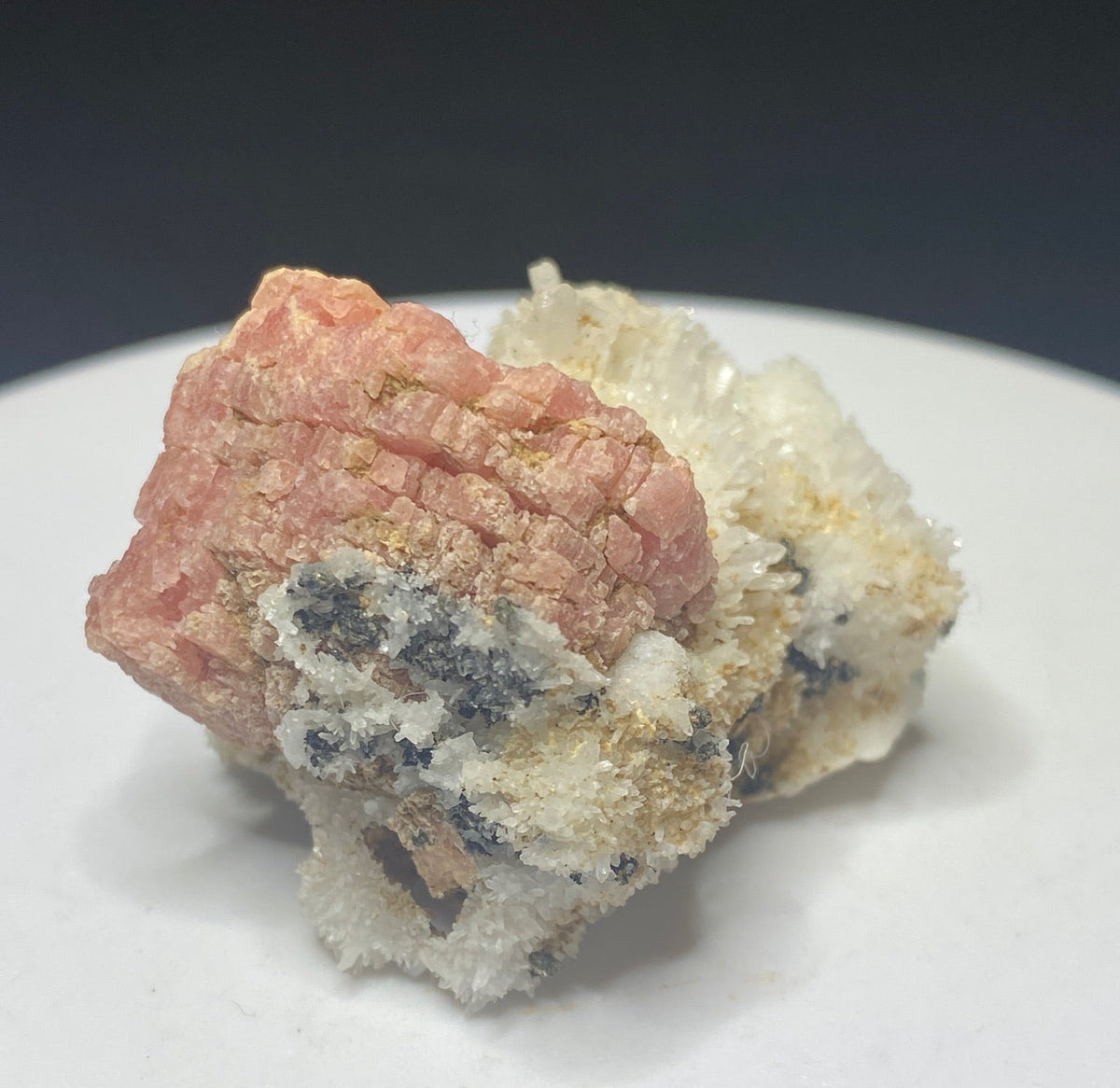 Pink rhodochrosite crystals on white quartz from Grizzly Mine, Colorado, USA