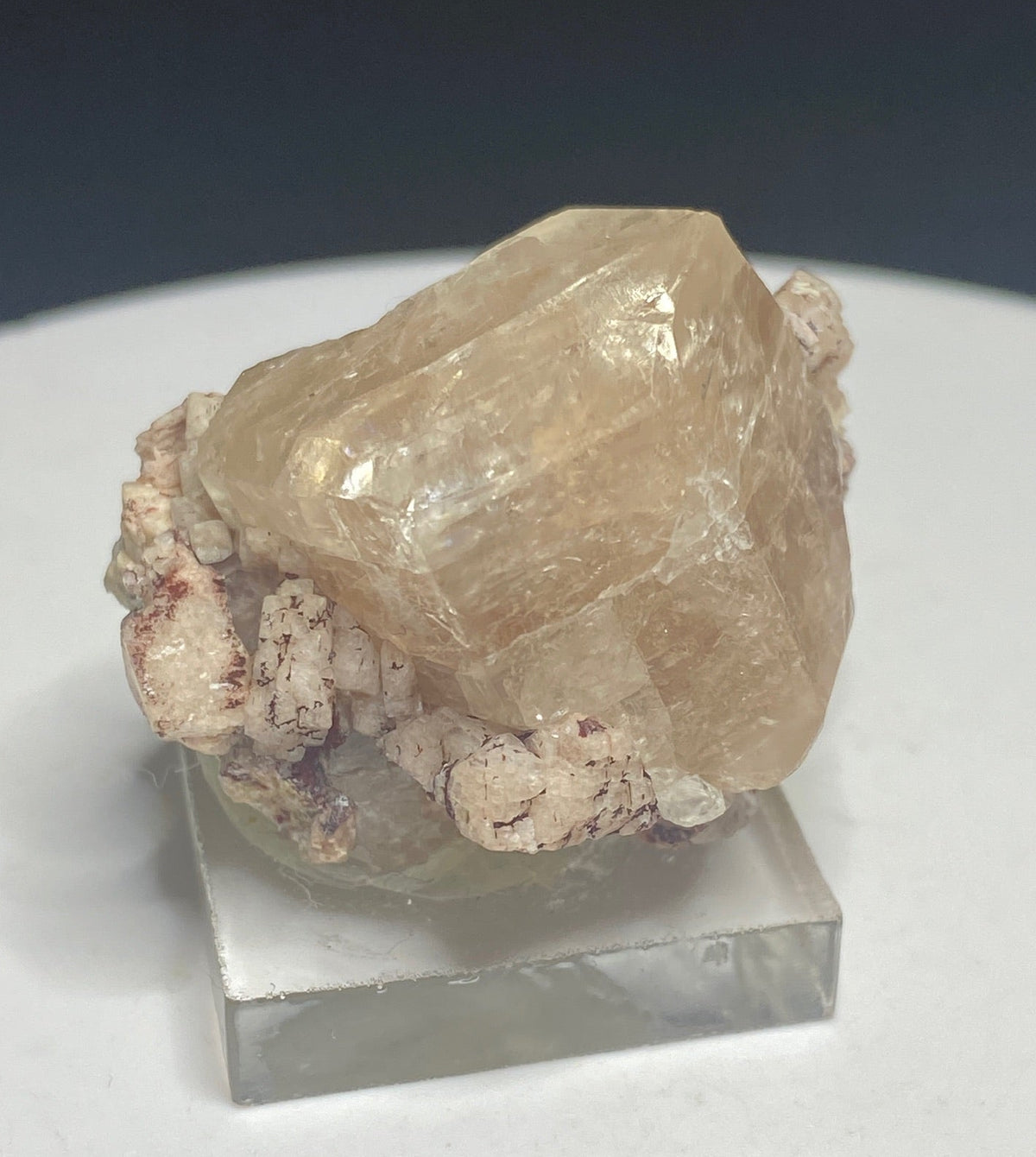 Pale peach apatite crystal from Divino das Laranjeiras, Minas Gerais, Brazil
