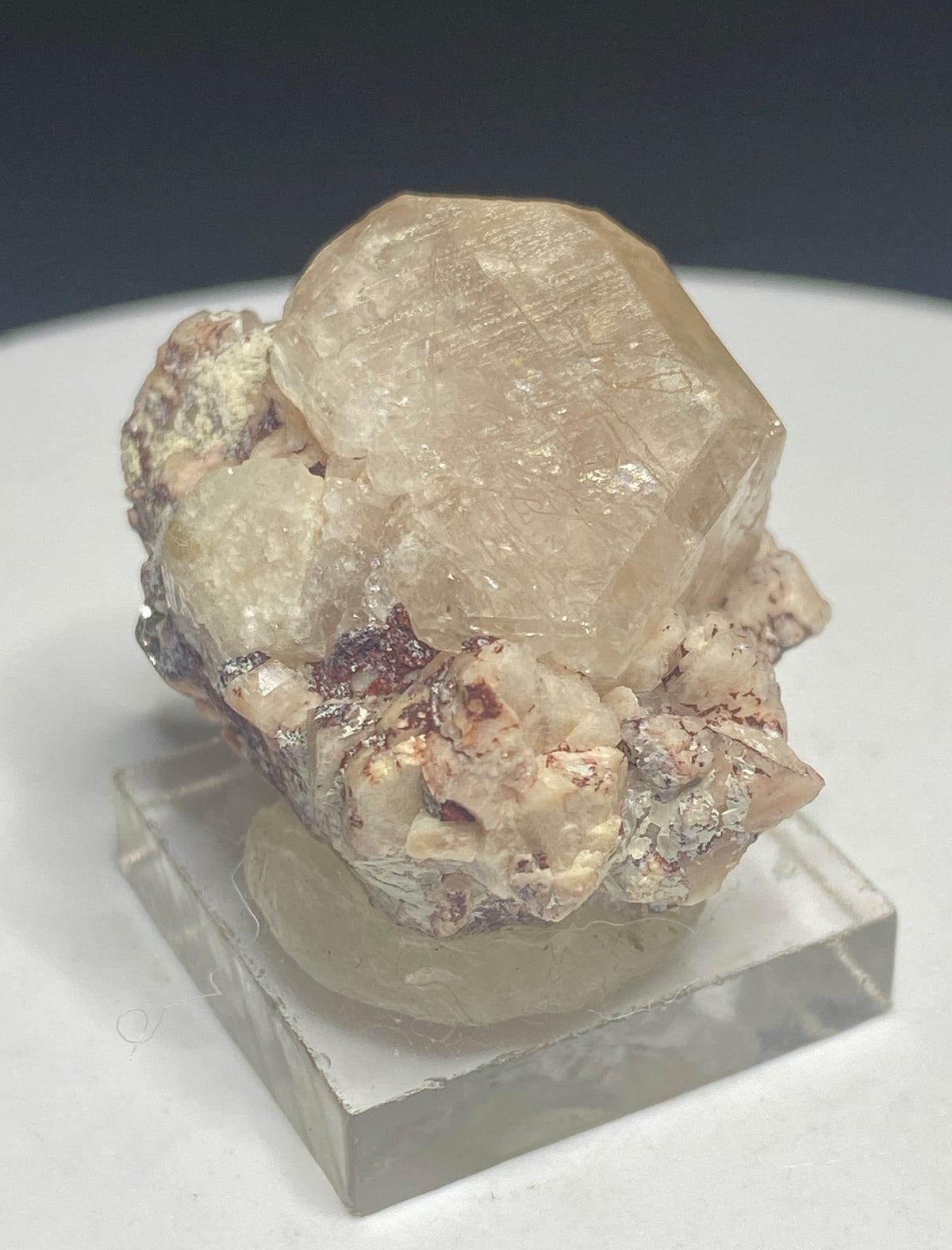 Pale peach apatite crystal from Divino das Laranjeiras, Minas Gerais, Brazil