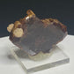 Reddish-brown bastnäsite crystal from Zegi Mountain, Kafor Dheri near Peshawar, Pakistan