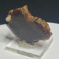 Reddish-brown bastnäsite crystal from Zegi Mountain, Kafor Dheri near Peshawar, Pakistan