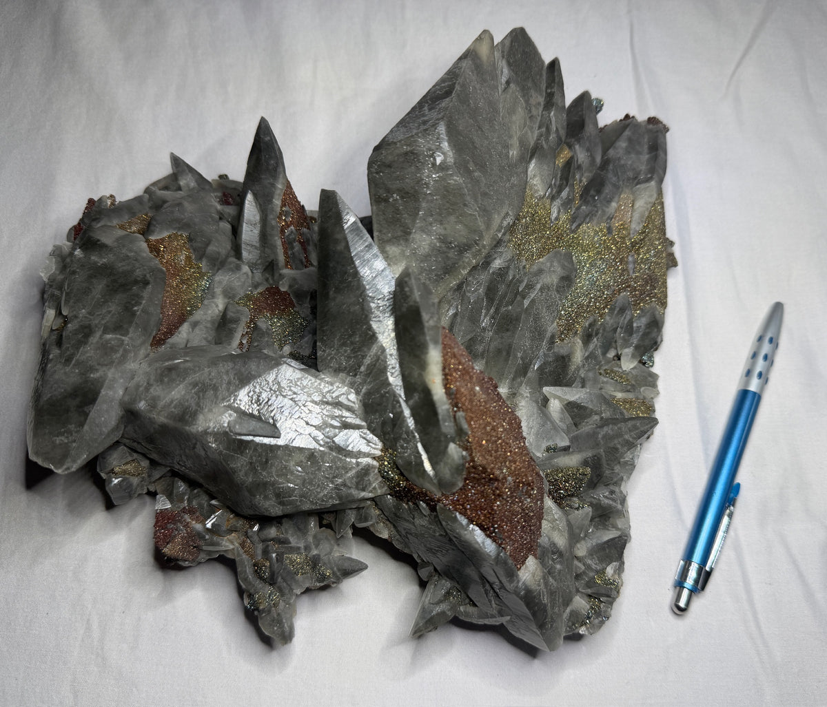 Large calcite crystals on sparkling marcasite from Brushy Creek Mine, Reynolds County, Missouri