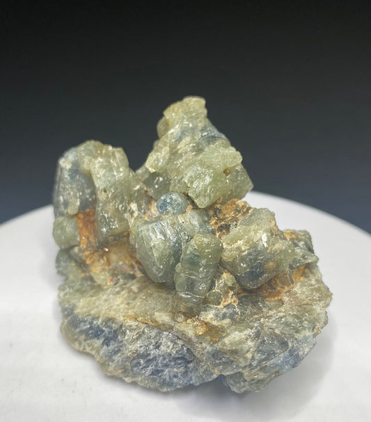Natural greenish-grey sapphire corundum crystal cluster from Mogok, Myanmar