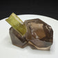 Green elbaite tourmaline crystal on smoky quartz from Paprok, Afghanistan