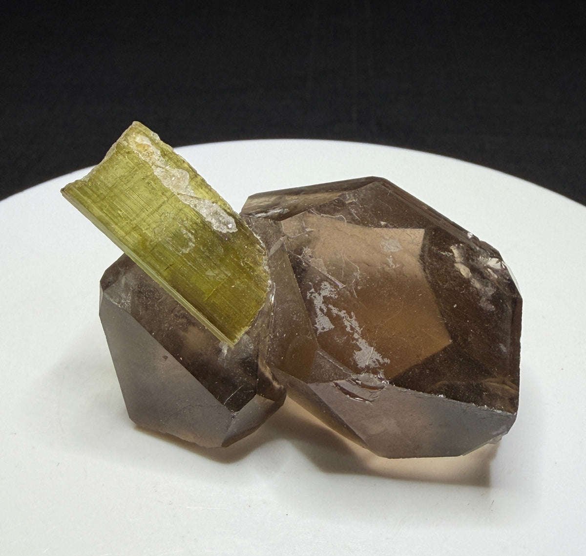 Green elbaite tourmaline crystal on smoky quartz from Paprok, Afghanistan