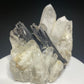 Dark bladed hübnerite crystals on clear quartz from Pasto Bueno, Pallasca Province, Ancash, Peru