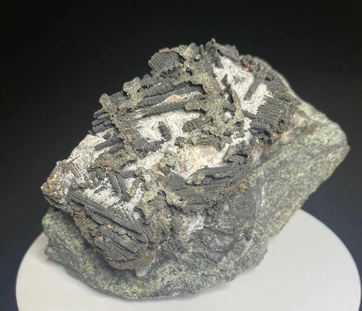 Löllingite over native silver mineral specimen from Castle Mine, Gowganda District, Ontario, Canada