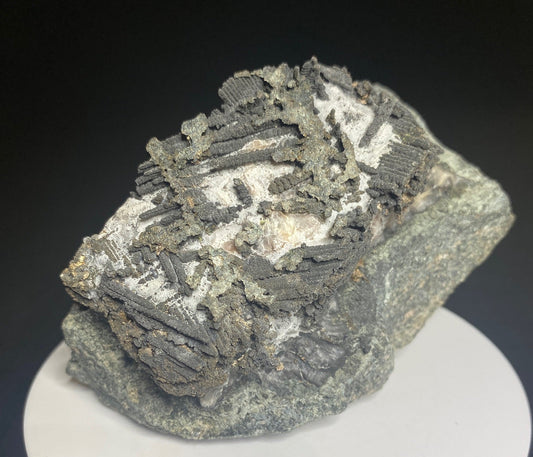 Löllingite over native silver mineral specimen from Castle Mine, Gowganda District, Ontario, Canada