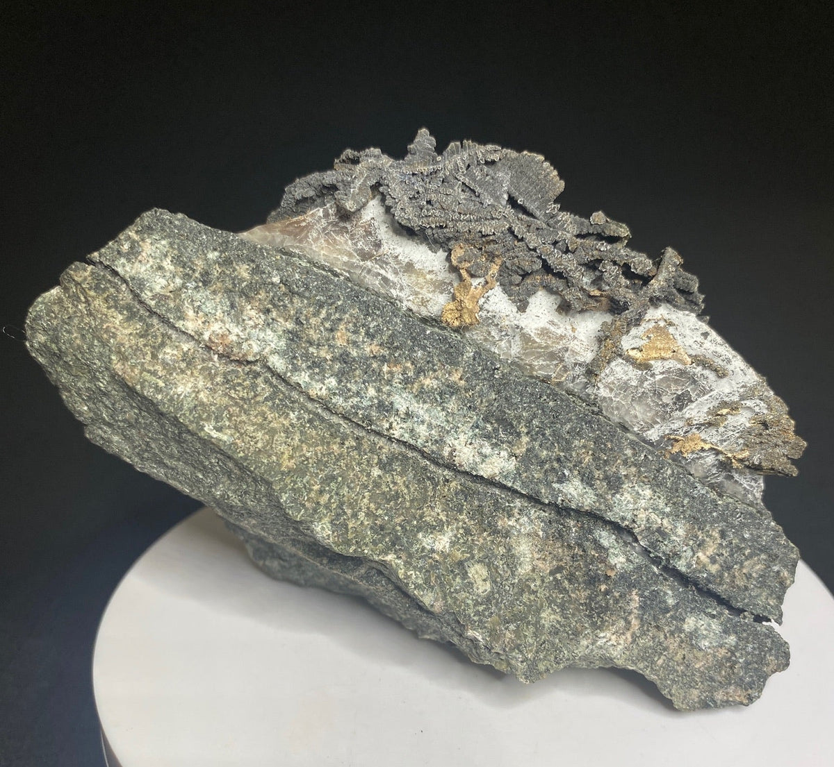 Löllingite over native silver mineral specimen from Castle Mine, Gowganda District, Ontario, Canada