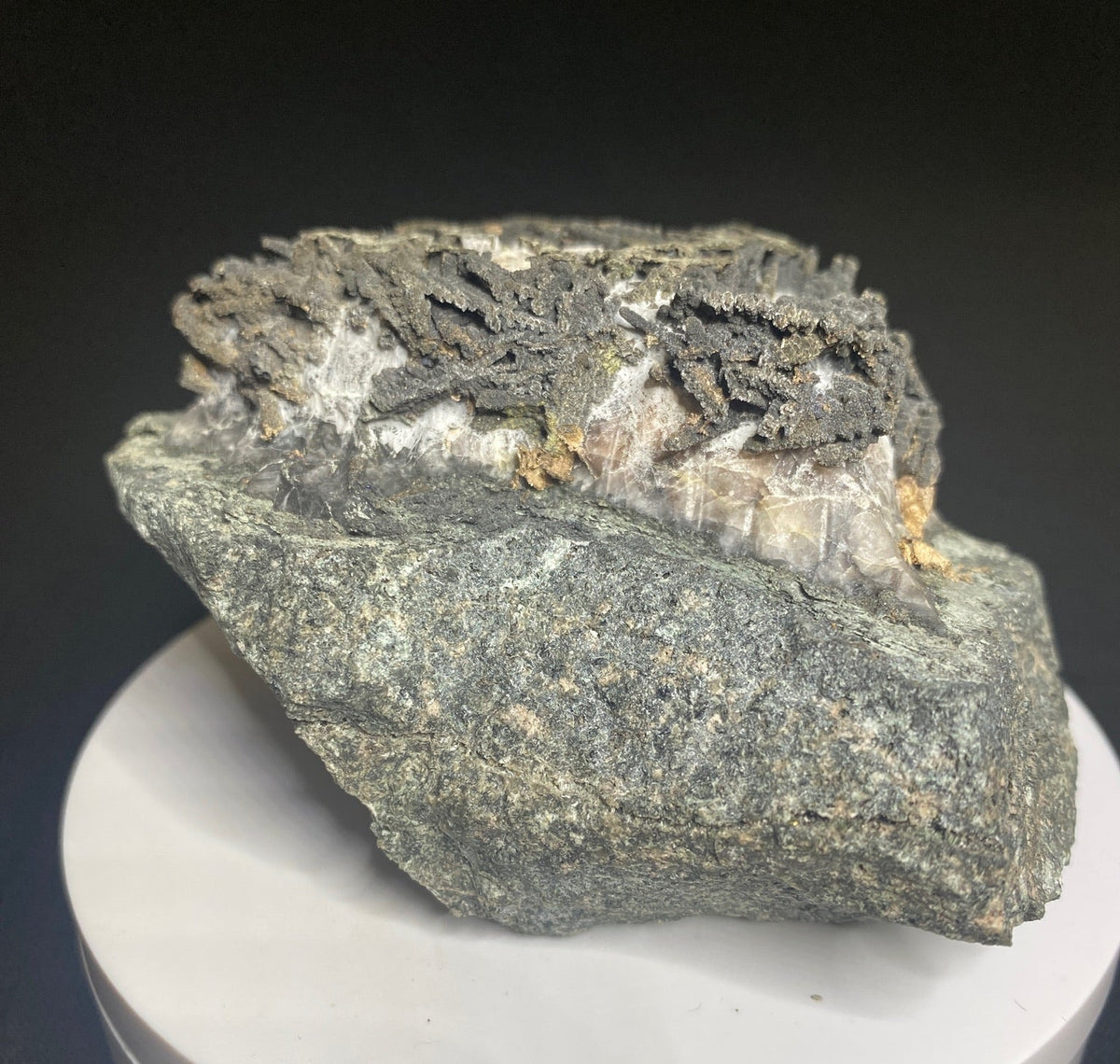Löllingite over native silver mineral specimen from Castle Mine, Gowganda District, Ontario, Canada