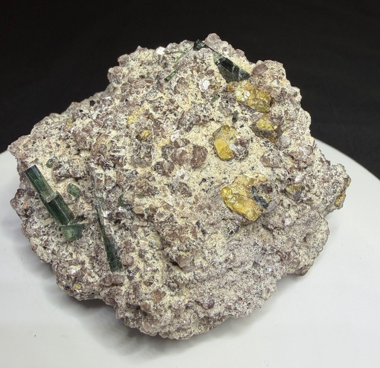 Microlite and black cassiterite with tourmaline on purple lepidolite from Virgem da Lapa, Minas Gerais, Brazil