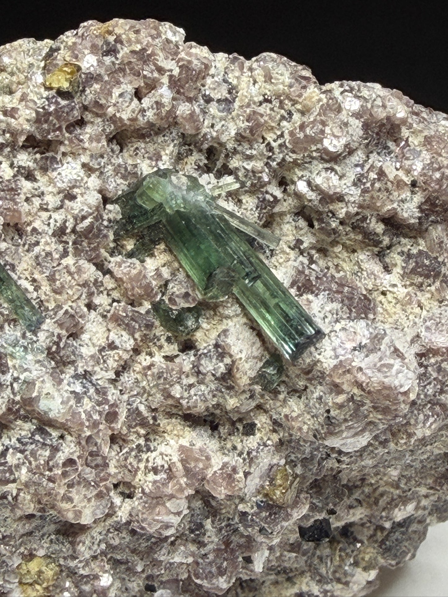Microlite and black cassiterite with tourmaline on purple lepidolite from Virgem da Lapa, Minas Gerais, Brazil