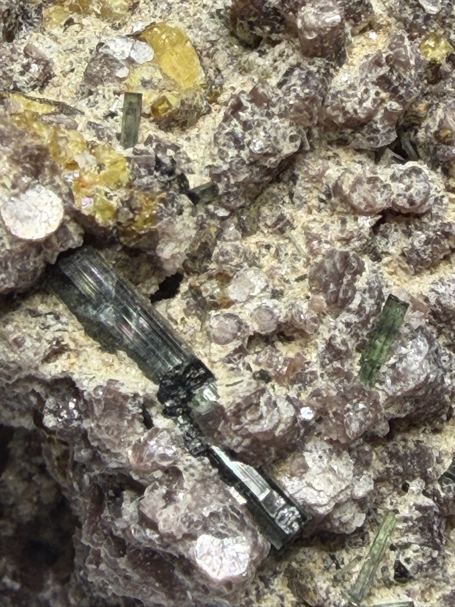 Microlite and black cassiterite with tourmaline on purple lepidolite from Virgem da Lapa, Minas Gerais, Brazil