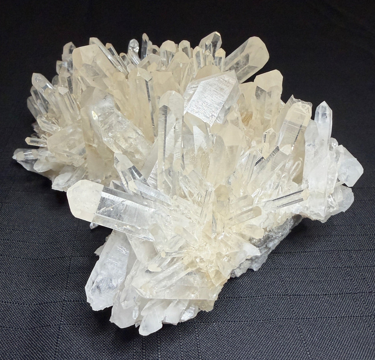 Large quartz crystal cluster with numerous clear terminated crystals from Jackpot Mine, Norman, Arkansas, USA
