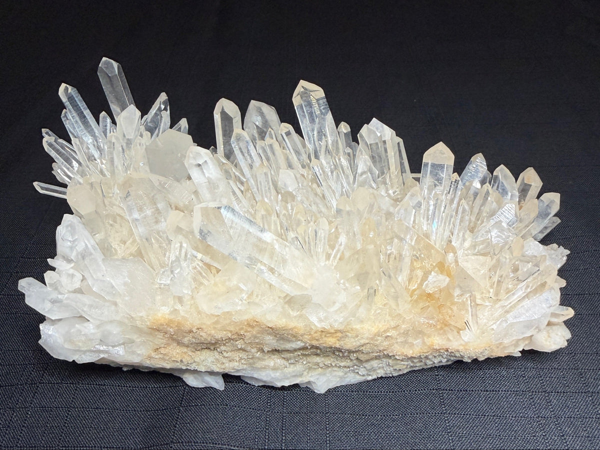 Large quartz crystal cluster with numerous clear terminated crystals from Jackpot Mine, Norman, Arkansas, USA