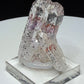 Clear quartz crystals with red and dark hematite inclusions from Goboboseb Mountains, Namibia