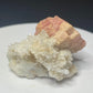Pink rhodochrosite crystals on white quartz from Grizzly Mine, Colorado, USA