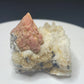 Pink rhodochrosite crystals on white quartz from Grizzly Mine, Colorado, USA