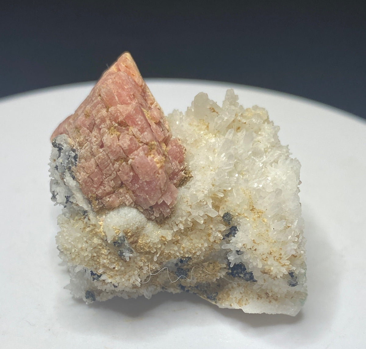 Pink rhodochrosite crystals on white quartz from Grizzly Mine, Colorado, USA