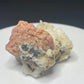 Pink rhodochrosite crystals on white quartz from Grizzly Mine, Colorado, USA
