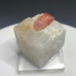 Pinkish-red ruby crystal on calcite from Dattaw Mine, Mogok, Myanmar