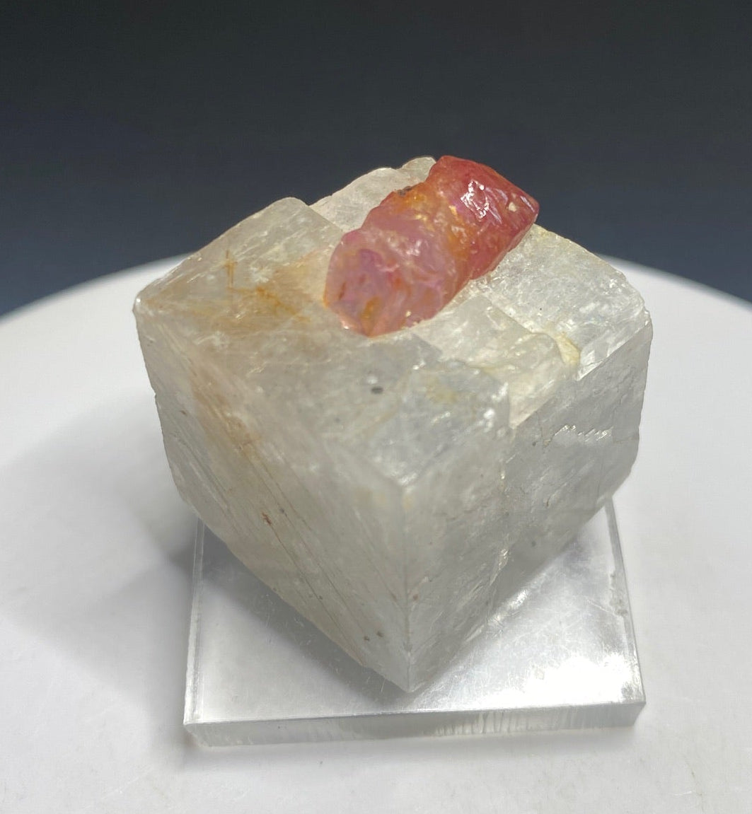 Pinkish-red ruby crystal on calcite from Dattaw Mine, Mogok, Myanmar