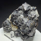 Dark lustrous sphalerite crystals with fluorite and quartz from Rodderup Mine, Cumberland, England