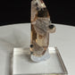 Sherry-colored topaz crystal with black bixbyite crystals from Topaz Mountain, Thomas Range, Utah, USA