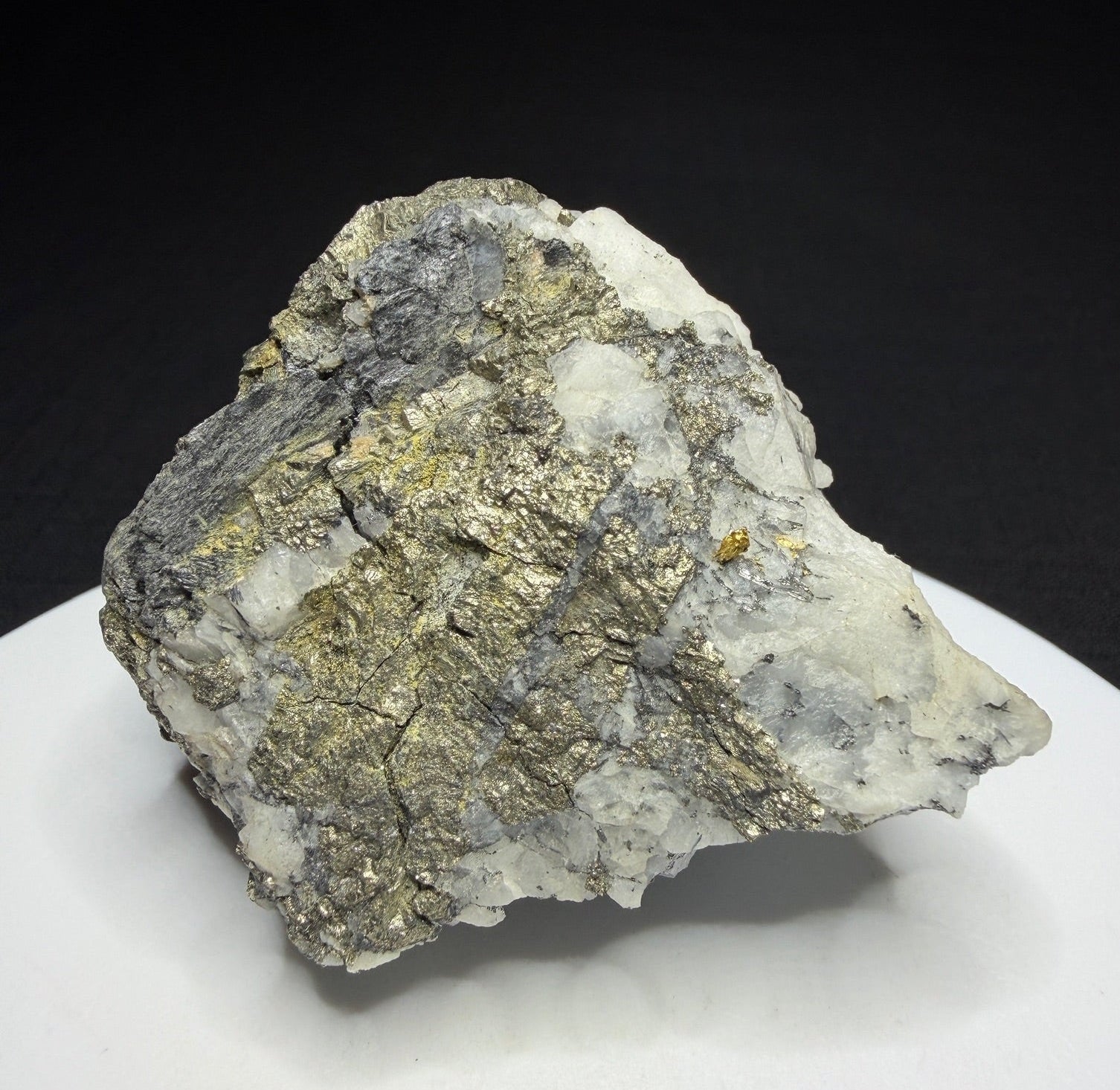 Metallic cosalite and native gold in white quartz from the Cariboo Gold Quartz Mine near Wells, British Columbia