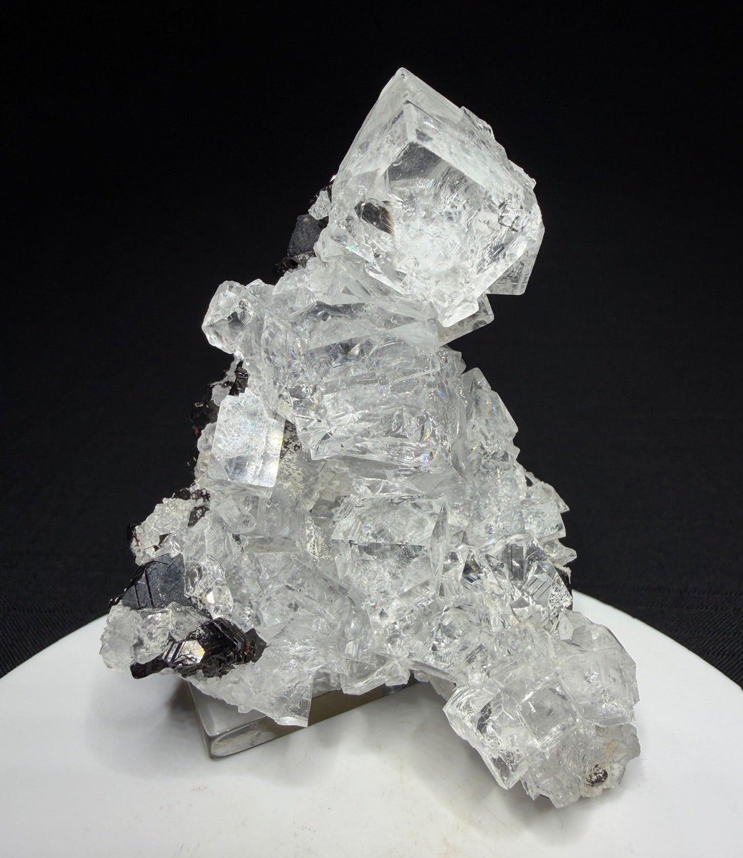 Colourless fluorite crystal cluster on dark matrix from the Nikolaevskiy Mine in Dalnegorsk, Russia