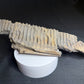 partial hadrosaur jaw showing empty teeth slots