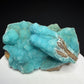 Turquoise-blue botryoidal hemimorphite on brown matrix from the Wenshan Mine in Yunnan, China