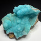 Turquoise-blue botryoidal hemimorphite on brown matrix from the Wenshan Mine in Yunnan, China