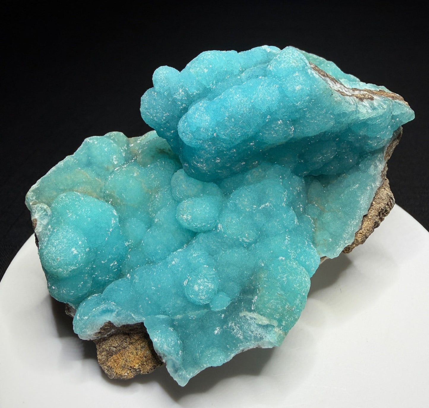 Turquoise-blue botryoidal hemimorphite on brown matrix from the Wenshan Mine in Yunnan, China