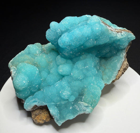 Turquoise-blue botryoidal hemimorphite on brown matrix from the Wenshan Mine in Yunnan, China