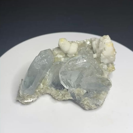 Pale blue aquamarine crystals with muscovite and orthoclase from Mt. Xuebaoding, Sichuan, China