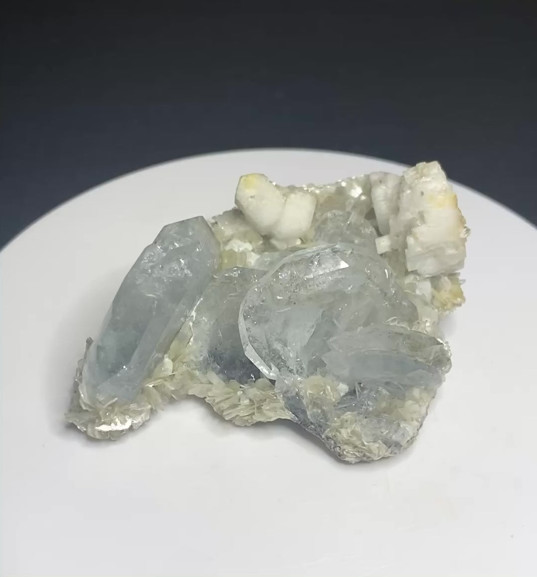 Pale blue aquamarine crystals with muscovite and orthoclase from Mt. Xuebaoding, Sichuan, China