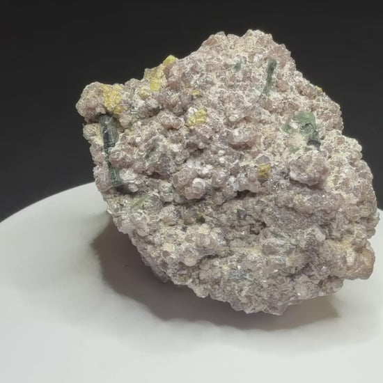 Microlite and black cassiterite with tourmaline on purple lepidolite from Virgem da Lapa, Minas Gerais, Brazil