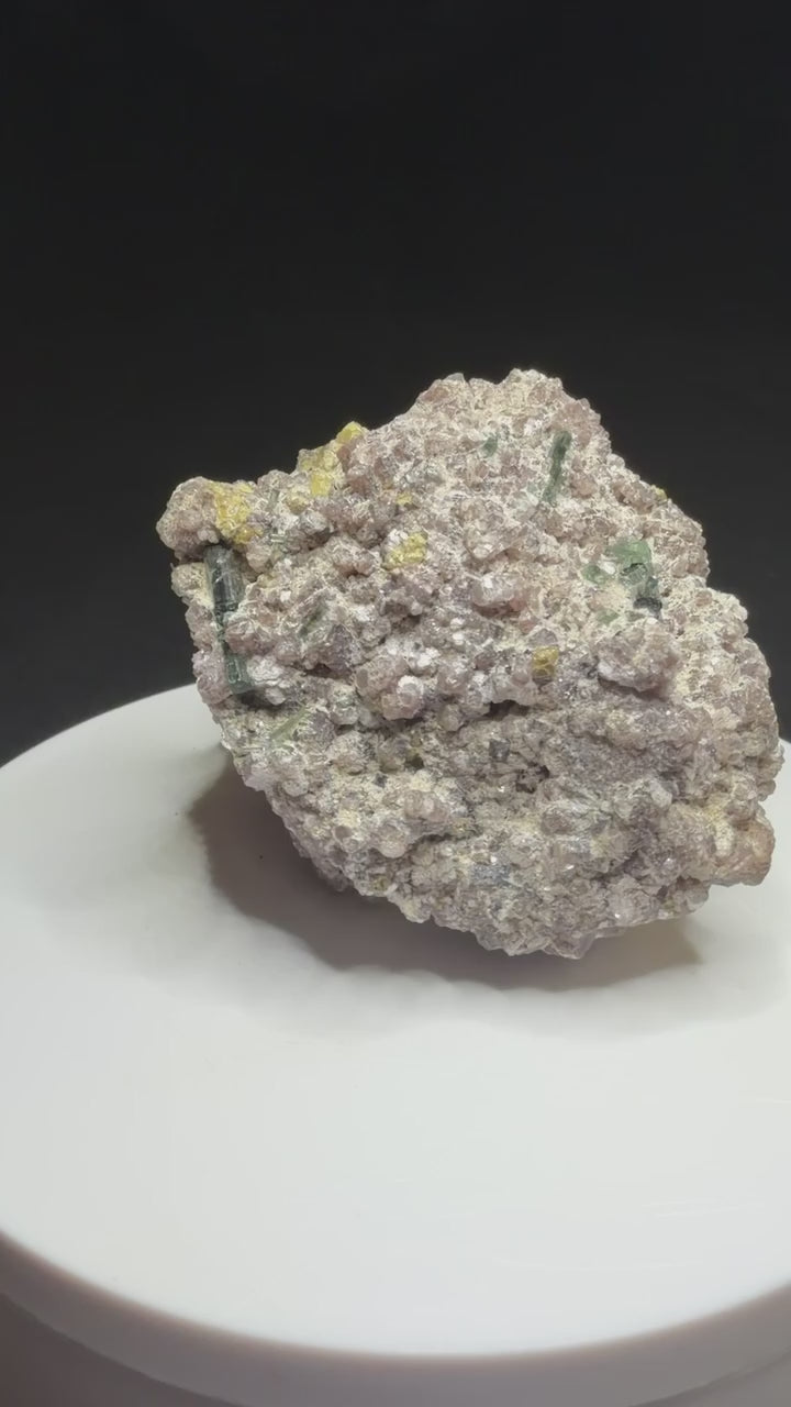 Microlite and black cassiterite with tourmaline on purple lepidolite from Virgem da Lapa, Minas Gerais, Brazil
