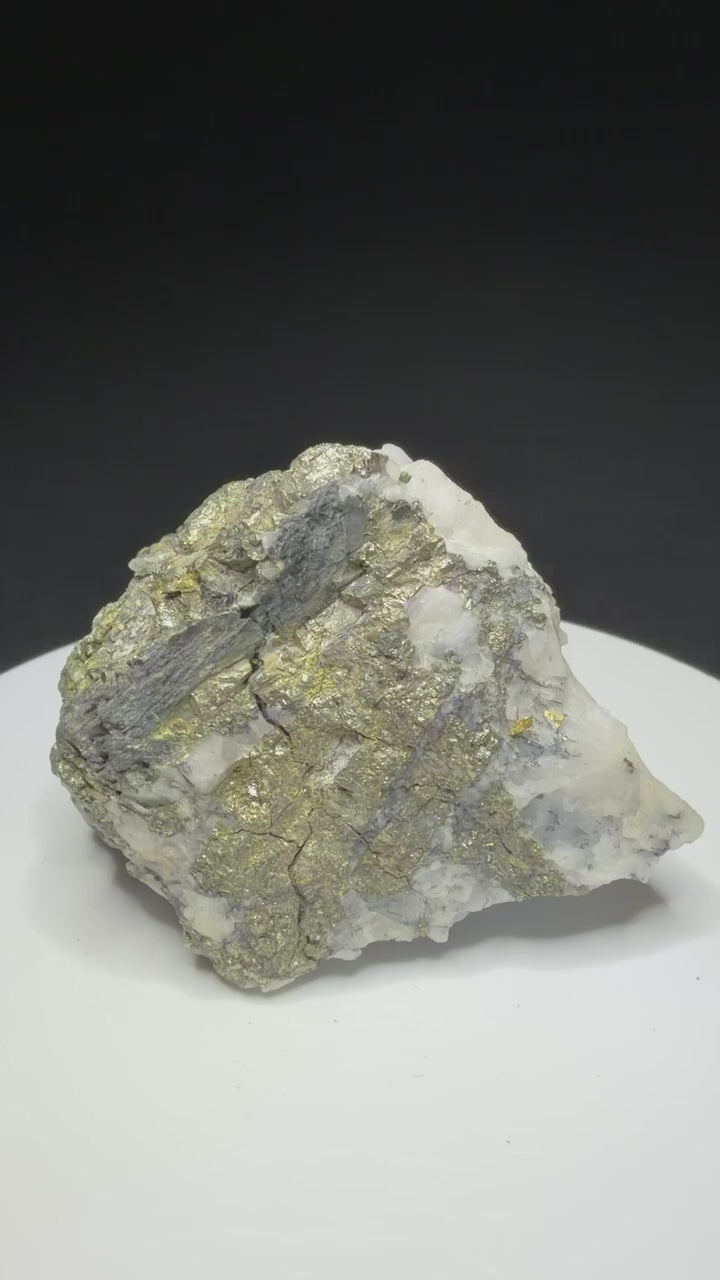 Metallic cosalite and native gold in white quartz from the Cariboo Gold Quartz Mine near Wells, British Columbia