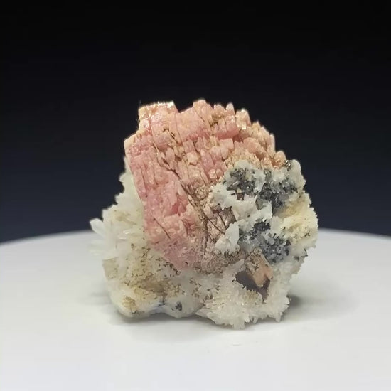 Pink rhodochrosite crystals on white quartz from Grizzly Mine, Colorado, USA