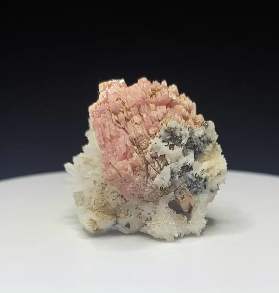 Pink rhodochrosite crystals on white quartz from Grizzly Mine, Colorado, USA