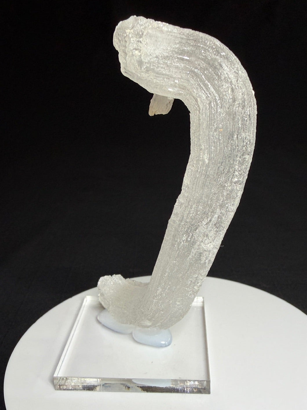 Curved white Ram’s Horn selenite from the Mariposa Mine in Texas